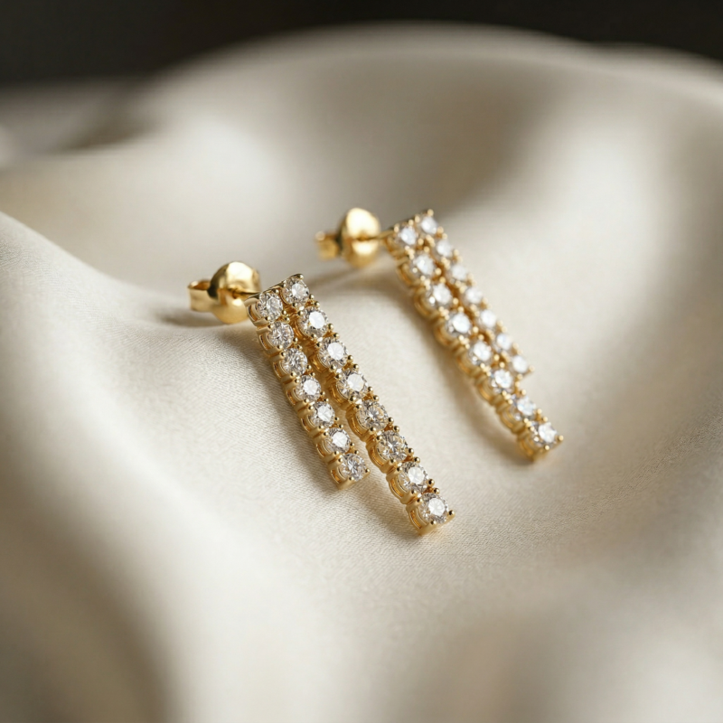 Ohrringe „Eternal“ aus 925er Sterling Silber, goldplattiert mit weißem Zirkonia